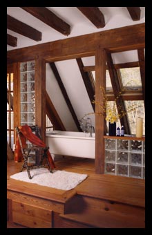 Custom seven-foot bath and skylights in historic mill in Albemarle County, Virginia, with renovations, designed by Candace Smith Architect, AIA