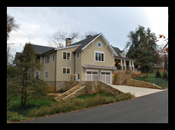 Alteratons and additions to residence in Charlottesville, Virginia, including fieldstone garden stairs and walls, custom stucco walls, with screened porch, designed by Candace M.P. Smith Architect