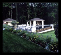 New pool house, changing pavilion and pool with disappearing edge designed by architect Candace Smith, AIA, for home in Albemarle County, Virginia